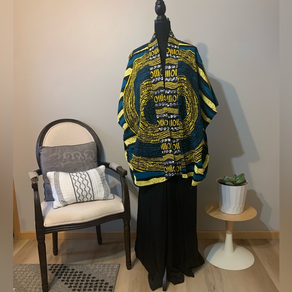 Dorma’s African Kimono

Dorma’s Couture 
REASONABLE OFFERS ACCEPTED